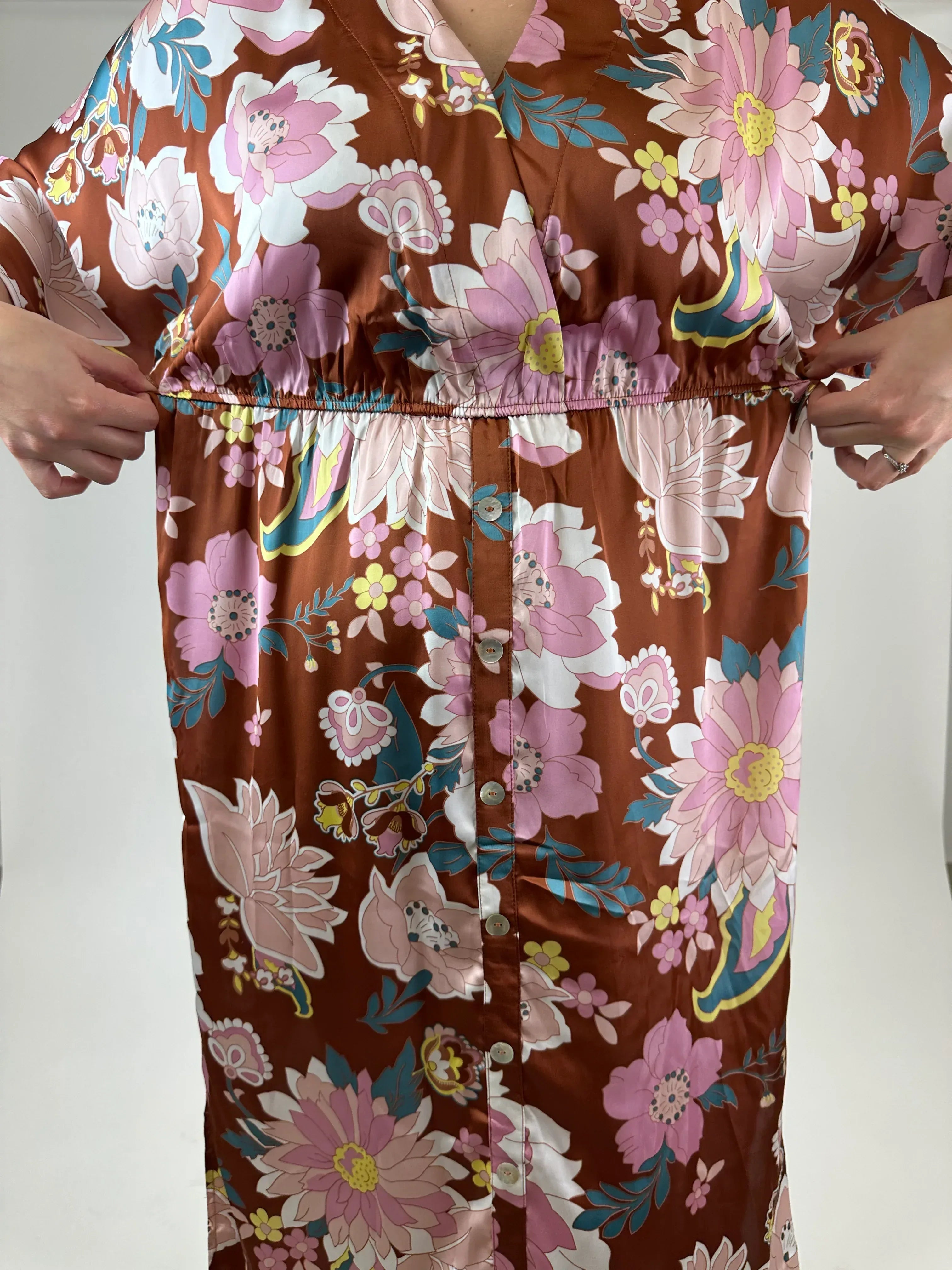 Floral dress with a brown background